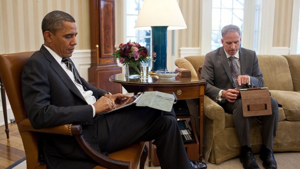 Barack Obama receives the Presidential Daily Briefing from Robert Cardillo, Deputy Director of National Intelligence for Intelligence Integration, in the Oval Office, Jan. 31, 2012.  
