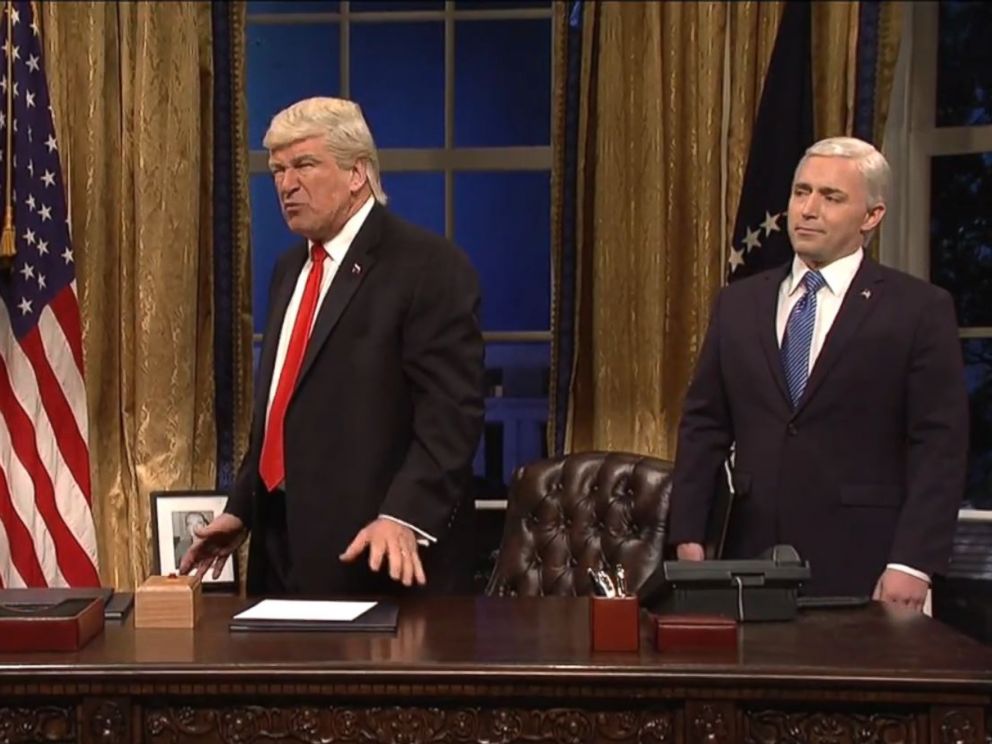 PHOTO: Alec Baldwin, portraying Donald Trump, is flanked by Saturday Night Live cast member Beck Bennett as Mike Pence, and the Grim Reaper, who is supposed to be White House chief strategist Steve Bannon, on Saturday Night Live on April 15, 2017.