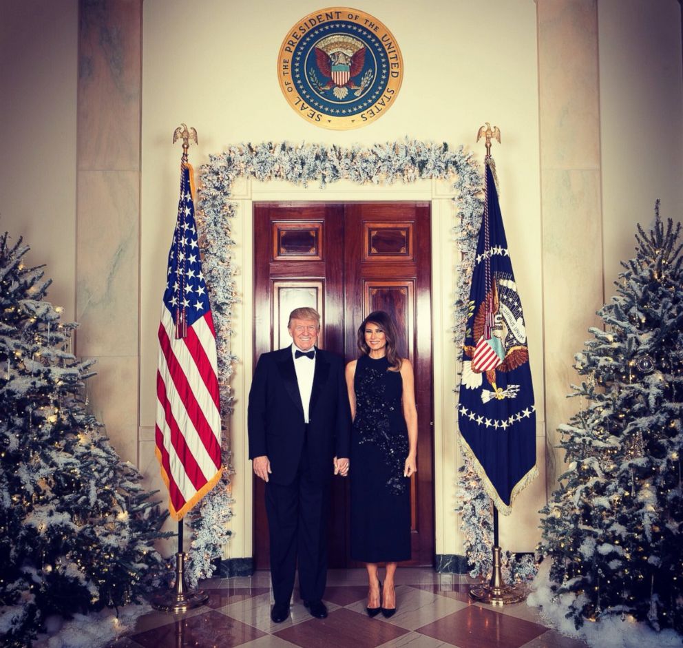 PHOTO: President Donald Trump and first lady Melania Trump in their official 2017 Christmas portrait, taken at the White House on December 5, 2017, and released on December 15, 2017.