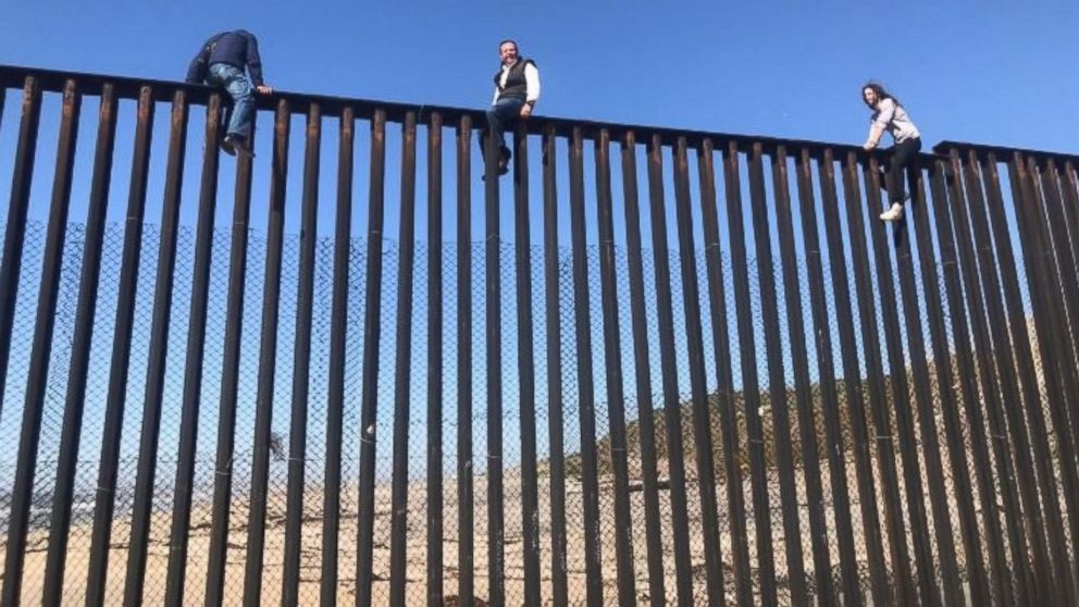 Mexican Congressman Climbs Us Border Fence To Illustrate That Trumps Wall Is Totally Absurd