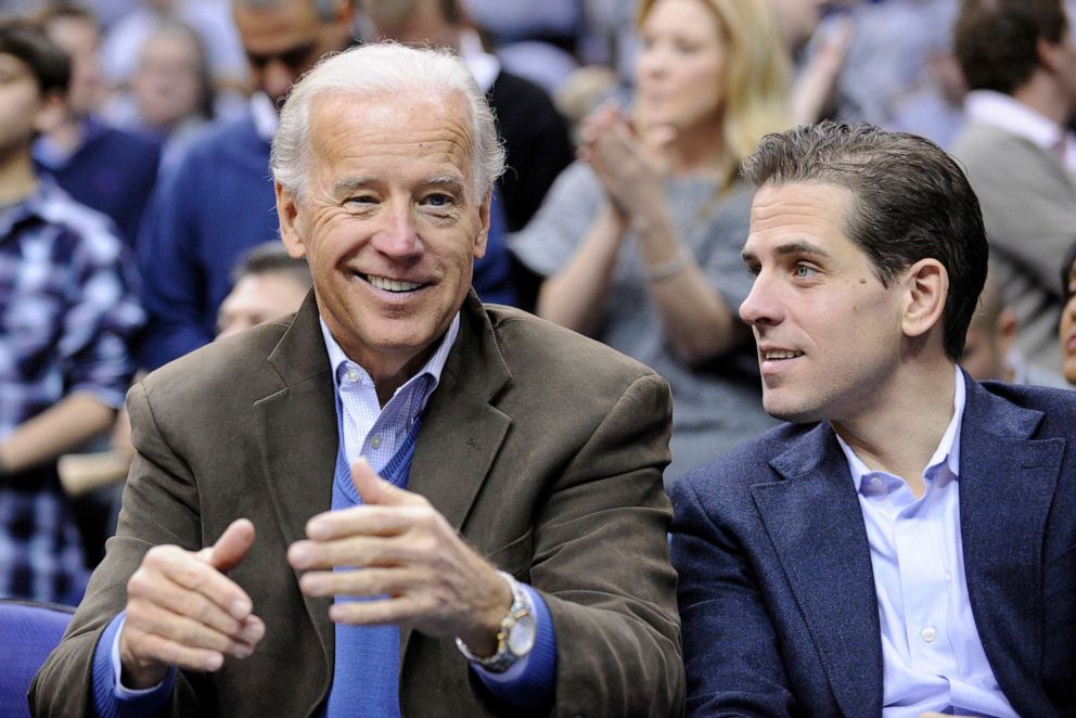 PHOTO: Vice President Joe Biden, left, with his son Hunter, right, at the Duke Georgetown NCAA college basketball game in Washington D.C., Jan. 30, 2010. 