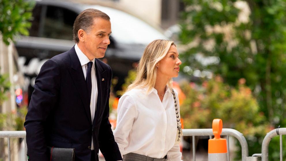 PHOTO: Hunter Biden, son of US President Joe Biden, joined by his wife Melissa Cohen Biden, enter the J. Caleb Boggs Federal Building in Wilmington, Del., on June 11, 2024.