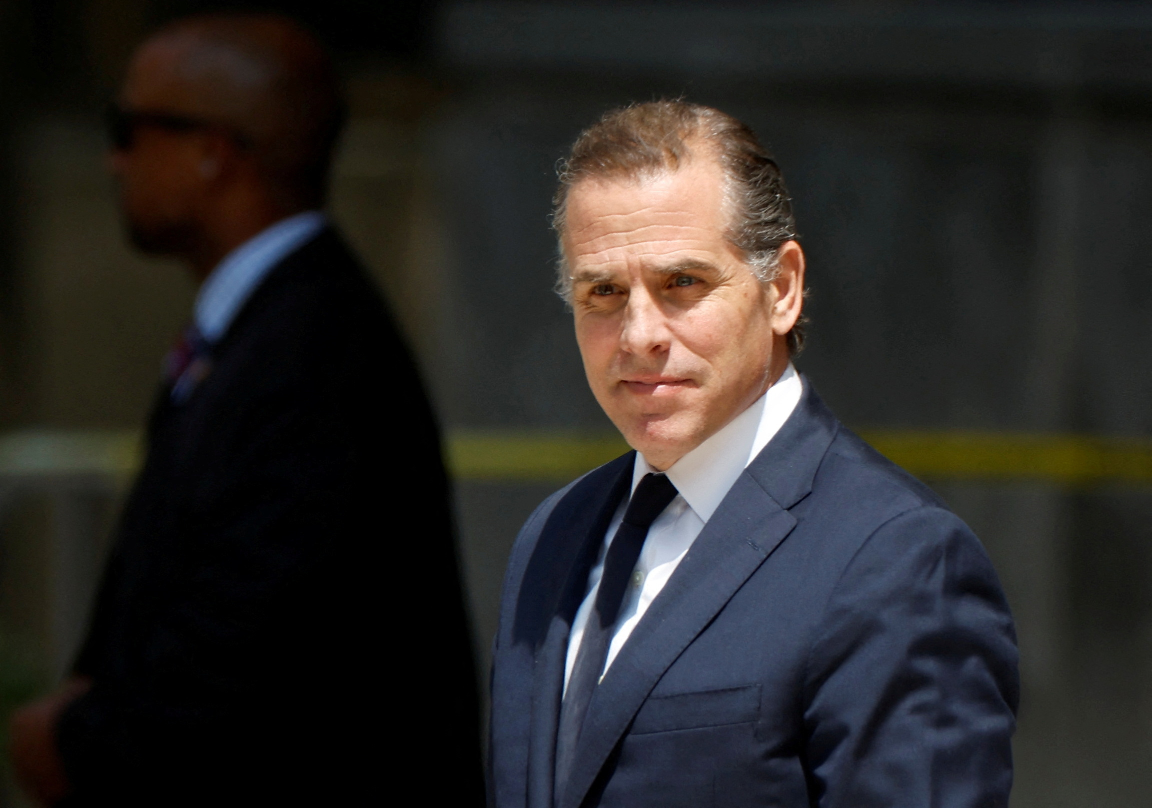 PHOTO: Hunter Biden, son of U.S. President Joe Biden, departs federal court after a plea hearing on two misdemeanor charges of willfully failing to pay income taxes in Wilmington, Del., July 26, 2023.