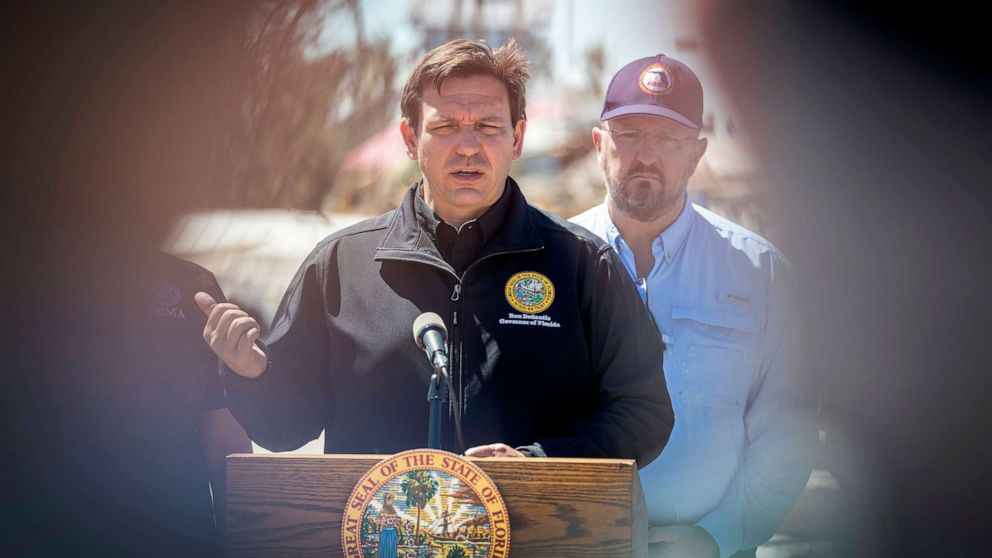 PHOTO: Florida's Governor Ron DeSantis speaks with the media in Matlacha Isles after the pass of the hurricane Ian in Fort Myers Beach, Fla., Sept. 30, 2022.