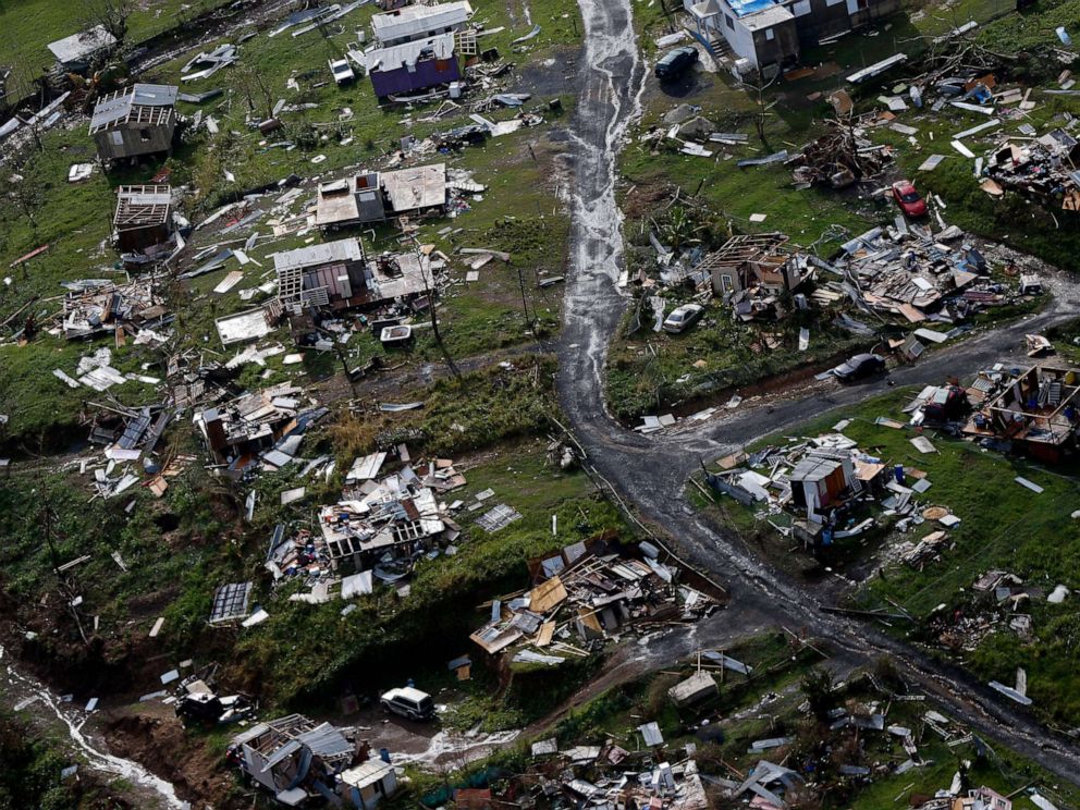 PHOTO: The rubble of homes is scattered in the aftermath of Hurricane Maria in Toa Alta, Puerto Rico, one week after the storm hit, Sept. 28, 2017.