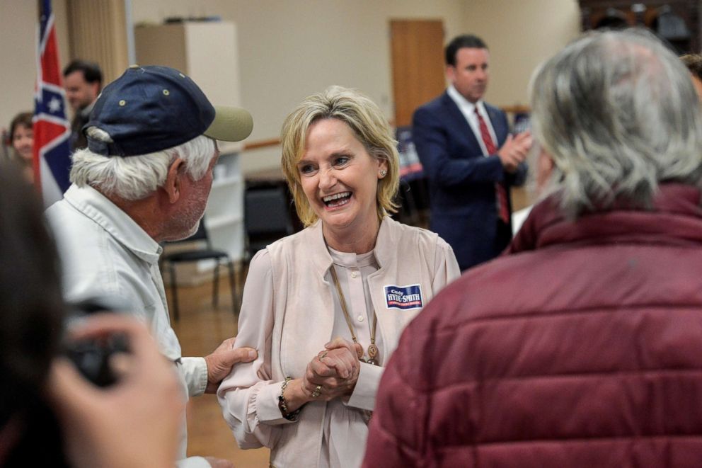 PHOTO: Senator Cindy Hyde-Smith speaks with supporters during a campaign stop at the Northwest Mississippi Association of Realtors office in Nesbit, Miss., Oct. 26, 2018. 