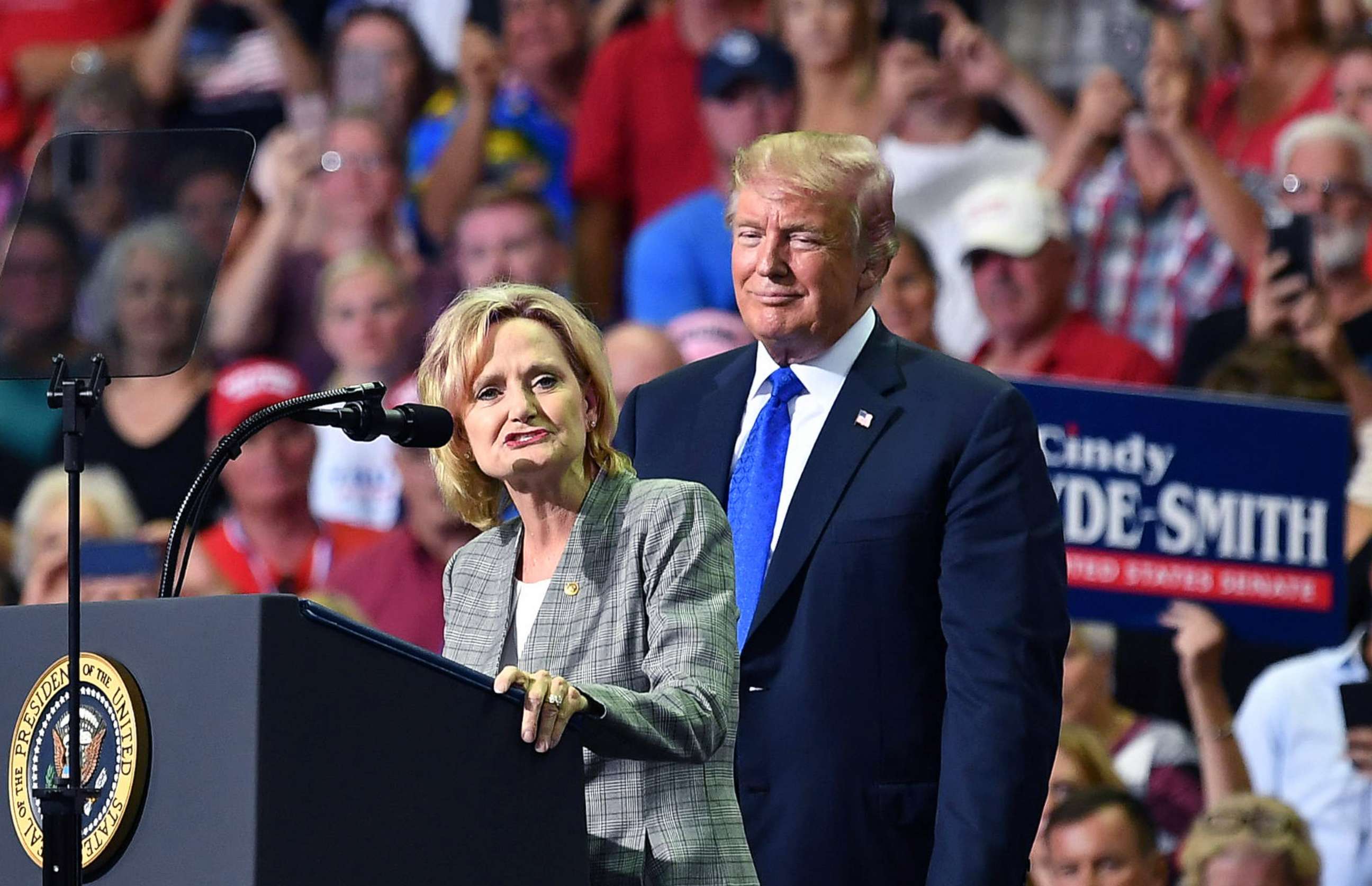 PHOTO: Senator Cindy Hyde-Smith takes the stage with President Donald Trump at a "Make America Great Again" rally at Landers Center in Southaven, Miss., on Oct. 2018.