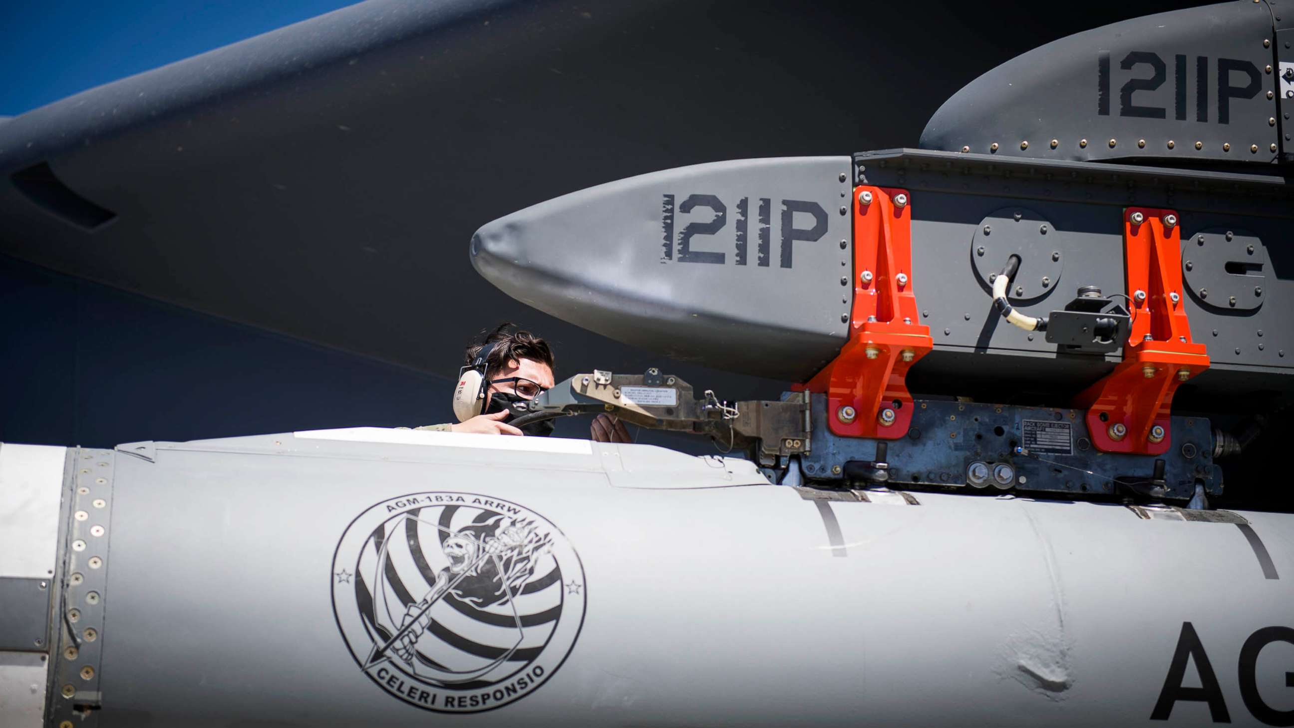 PHOTO: Staff Sgt. Jacob Puente, 912th Aircraft Maintenance Squadron, secures the AGM-183A Air-launched Rapid Response Weapon Instrumented Measurement Vehicle 2 as it is loaded under the wing of a B-52H Stratofortress, California, Aug. 6.