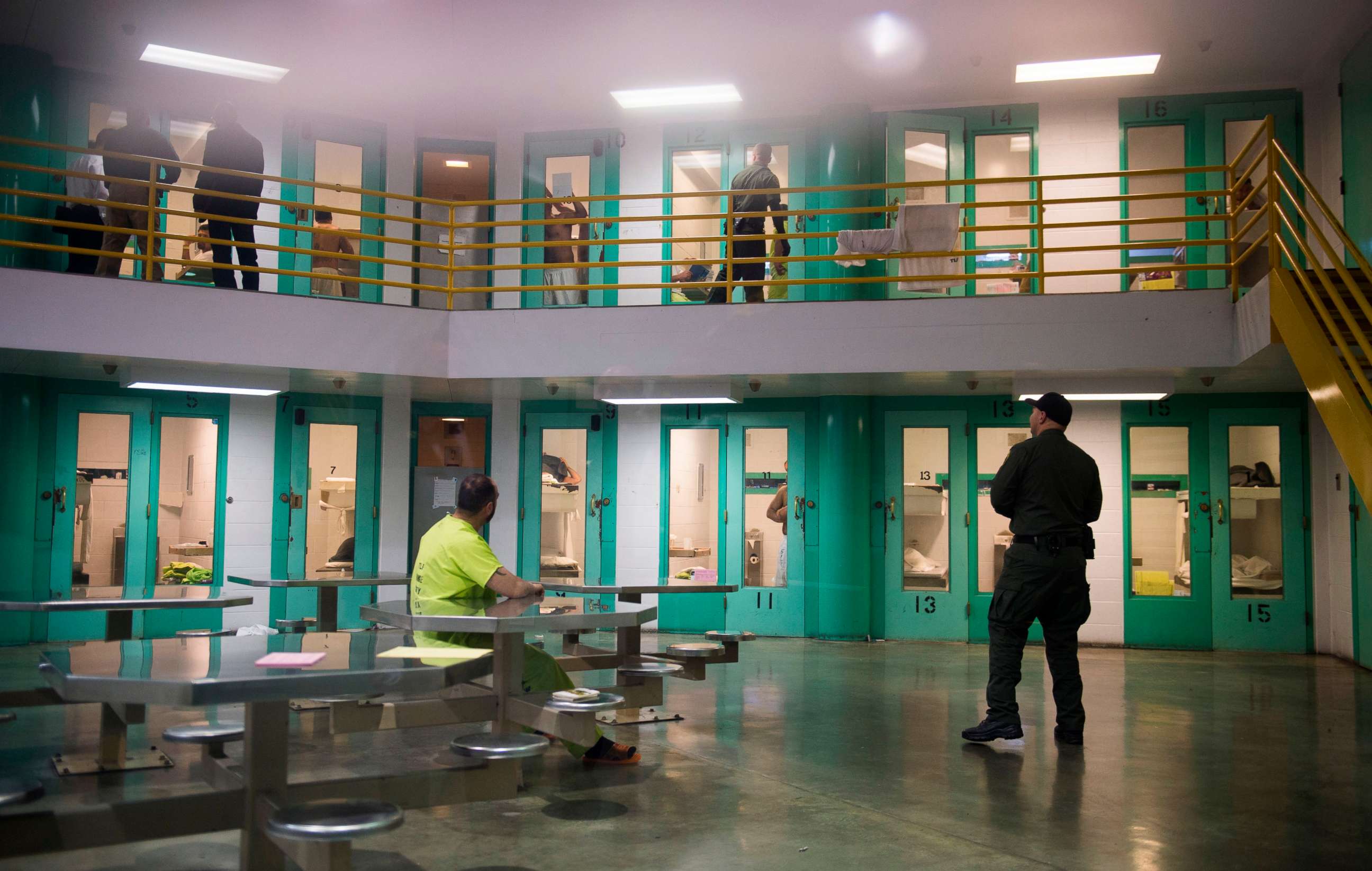 PHOTO: A sheriff's deputy talks to an immigration detainee in a high security housing unit at the Theo Lacy Facility, a county jail which also houses immigration detainees arrested by the US Immigration and Customs Enforcement  (ICE), March 14, 2017.