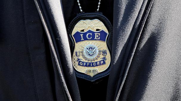 In this Sept. 5, 2019, file photo, an ICE agent badge is shown in Revere, Mass.