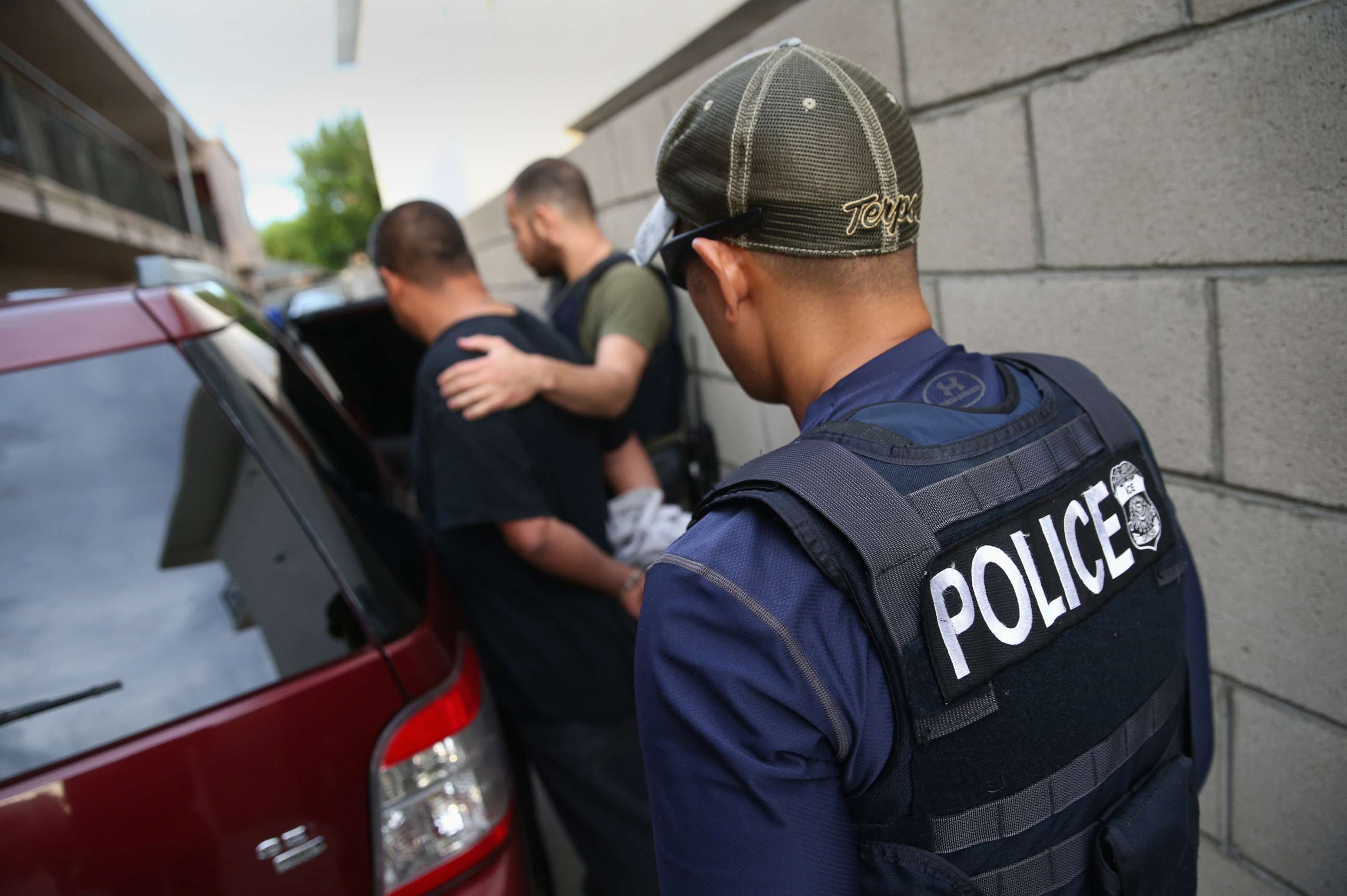 PHOTO: A man is detained by U.S. Immigration and Customs Enforcement (ICE) agents, Oct. 14, 2015, in Los Angeles, Calif.
