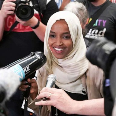 PHOTO: Rep. Ilhan Omar speaks to supporters as she arrives at Minneapolis' Saint Paul International Airport, July 18, 2019, in Minnesota. 