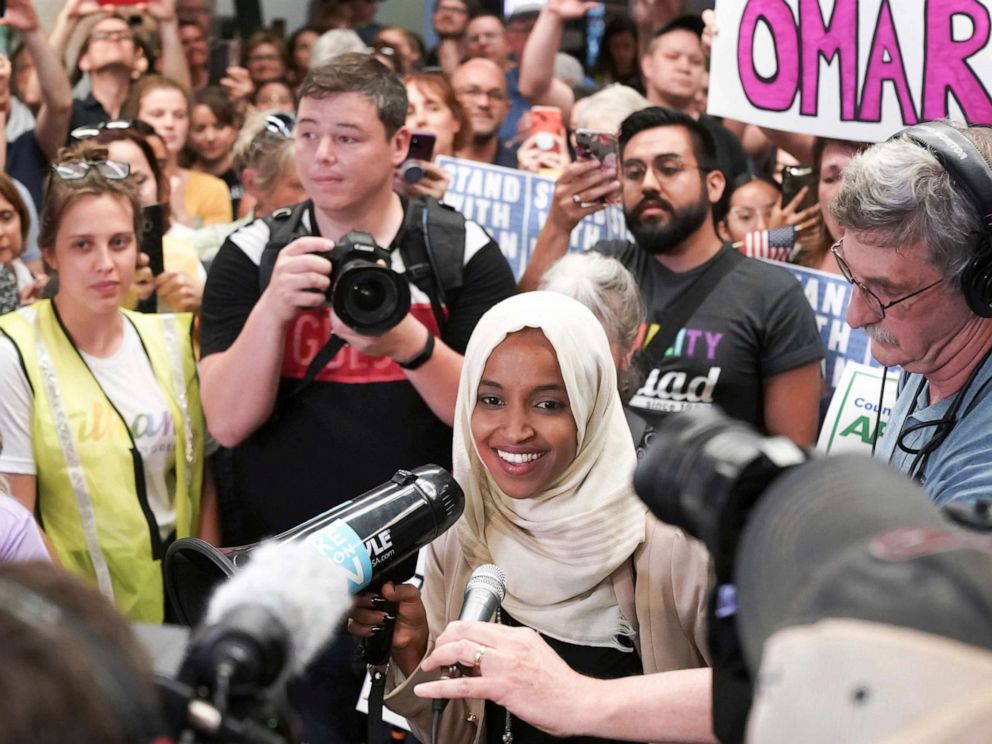 PHOTO: Rep. Ilhan Omar speaks to supporters as she arrives at Minneapolis Saint Paul International Airport, July 18, 2019, in Minnesota.