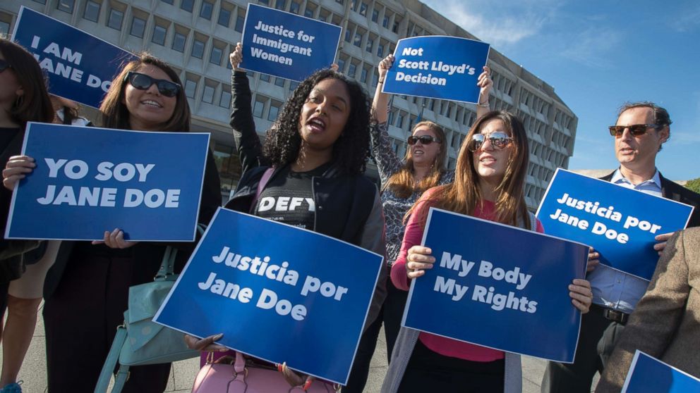 Activists with Planned Parenthood demonstrate in support of a pregnant 17-year-old being held in a Texas facility for unaccompanied immigrant children to obtain an abortion, outside of the Department of Health and Human Services in Washington, Oct. 20, 2017. 