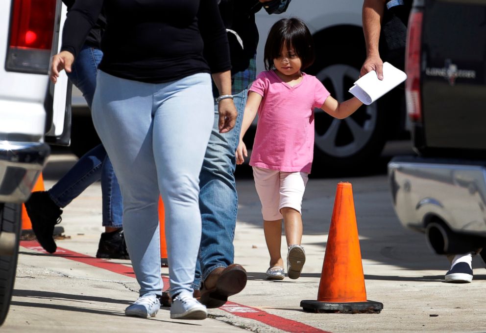   PHOTO: Immigrant families leave a US immigration and customs facility after reunification on July 11, 2018, in San Antonio. 