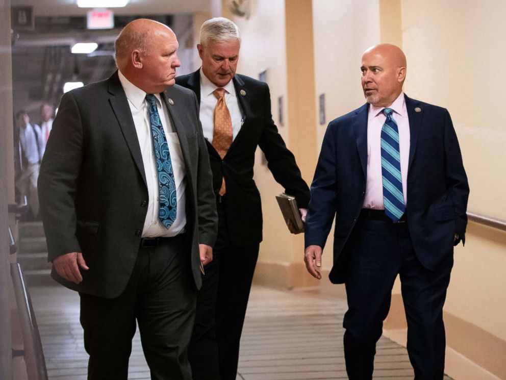 PHOTO: Rep. Glenn Thompson, Rep. Steve Womack, and Rep. Tom MacArthur walk to a closed-door GOP meeting on immigration in the basement of the Capitol in Washington, June 7, 2018.