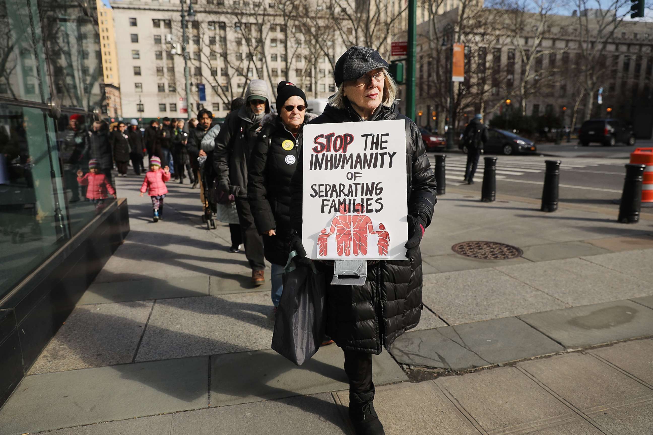 PHOTO: A woman carries a sign in a demonstration where immigration activists, clergy members and others gathered against the imprisonment and potential deportation of an immigration activist in front of the Federal Building on Jan. 29, 2018 in New York.