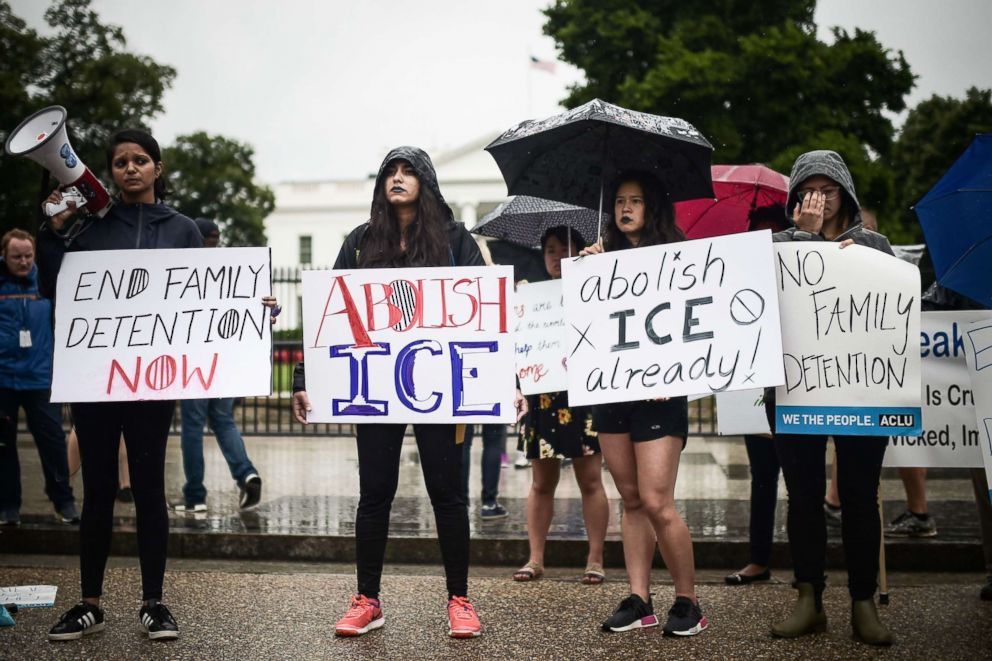 PHOTO: Activists gather outside the White House in response to a call from the American Civil Liberties Union (ACLU) to protest the separation of children from their migrant families at the US-Mexico border, June 22, 2018, in Washington, DC.