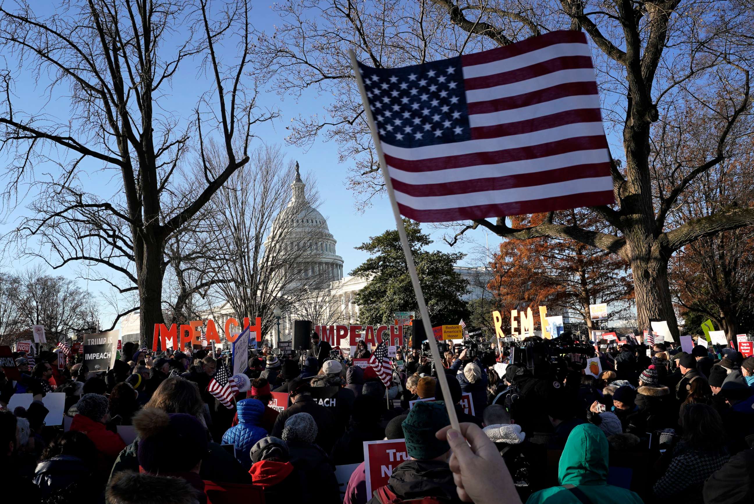 PHOTO: Protesters supporting the impeachment of U.S. President Donald Trump gather outside the U.S. Capitol Dec. 18, 2019, in Washington.