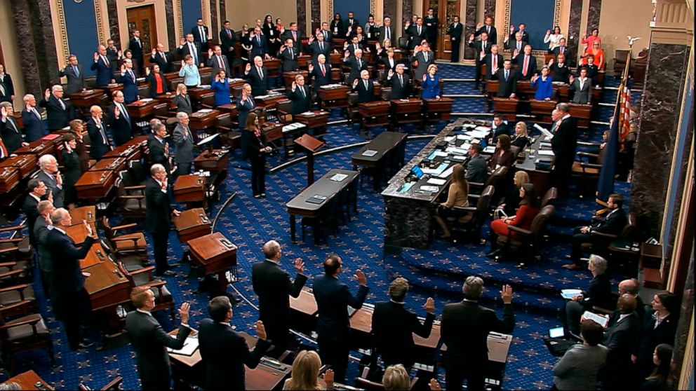 PHOTO: In this image from video, presiding officer Supreme Court Chief Justice John Roberts swears in members of the Senate for the impeachment trial against President Donald Trump at the Capitol, Jan. 16, 2020. 