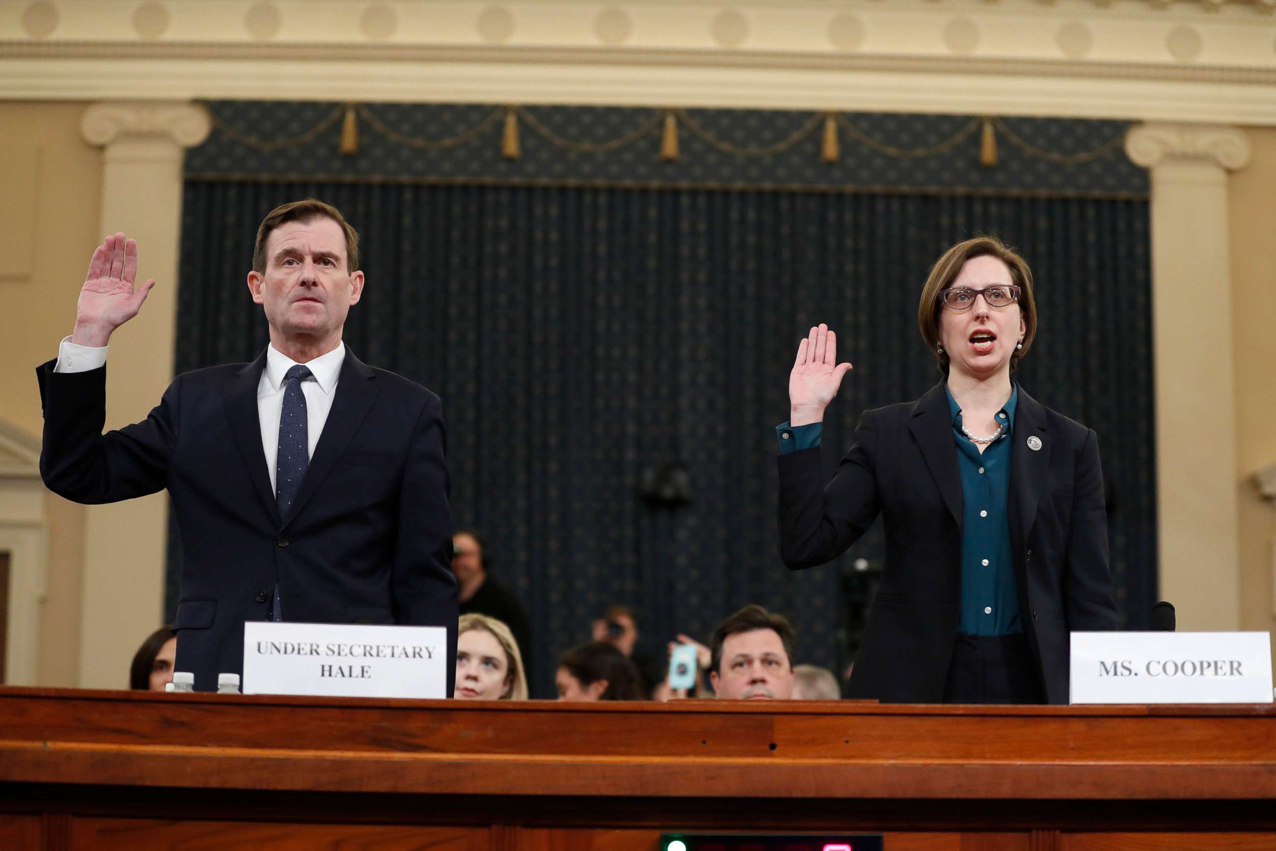 PHOTO: Deputy Assistant Secretary of Defense Laura Cooper, right, and State Department official David Hale, are sworn in to testify before the House Intelligence Committee on Capitol Hill in Washington, Nov. 20, 2019.