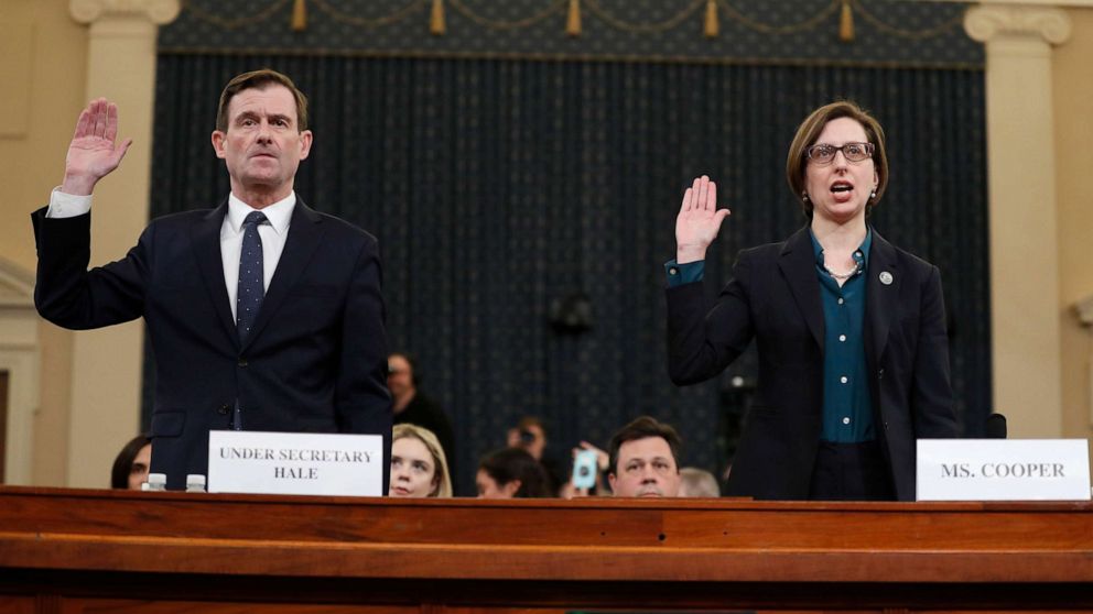 PHOTO: Deputy Assistant Secretary of Defense Laura Cooper, right, and State Department official David Hale, are sworn in to testify before the House Intelligence Committee on Capitol Hill in Washington, Nov. 20, 2019.