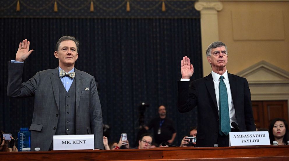 PHOTO: George Kent and Bill Taylor take the oath during the impeachment inquiry into President Donald Trump in Washington, Nov. 13, 2019.