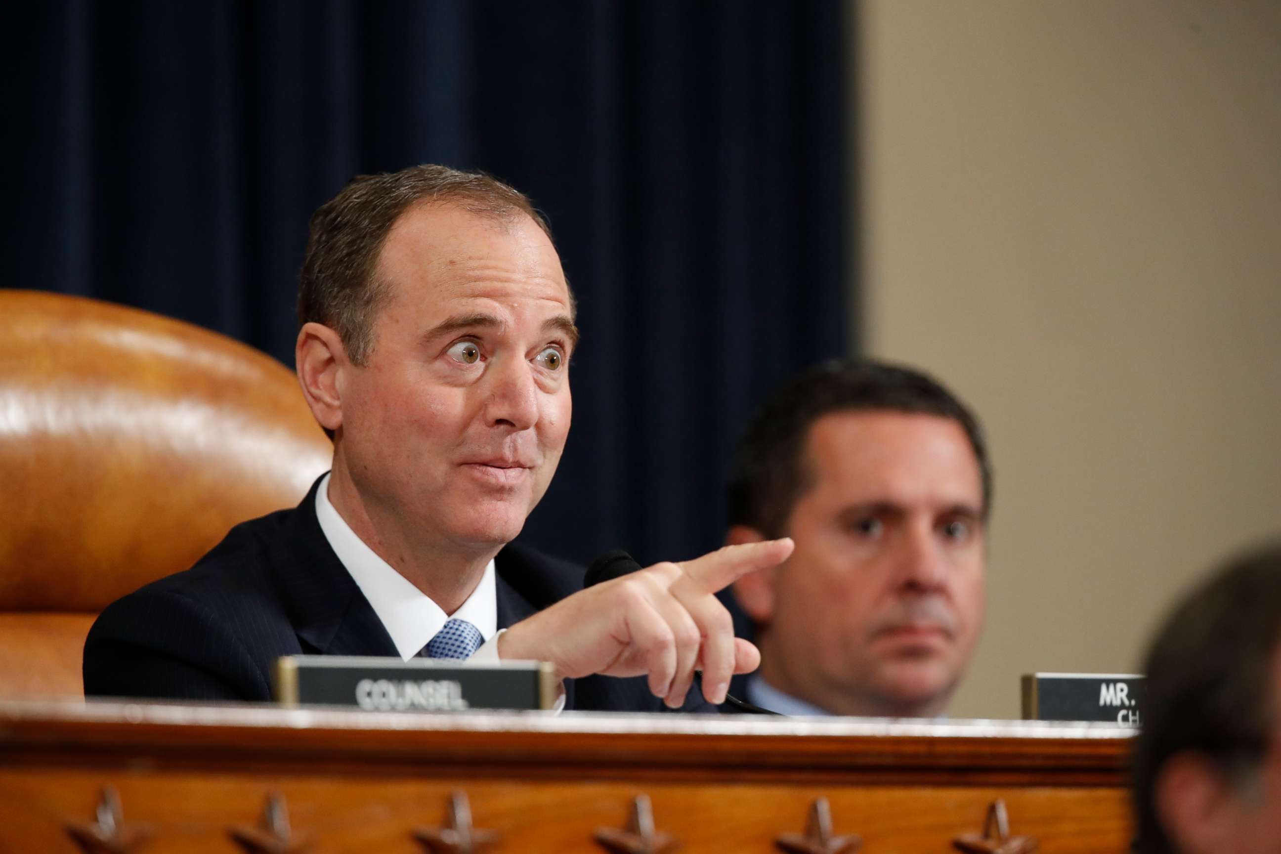 PHOTO: Rep. Adam Schiff questions witnesses as ranking member Rep. Devin Nunes looks on during a hearing of the House Intelligence Committee on Capitol Hill in Washington, Nov. 13, 2019.