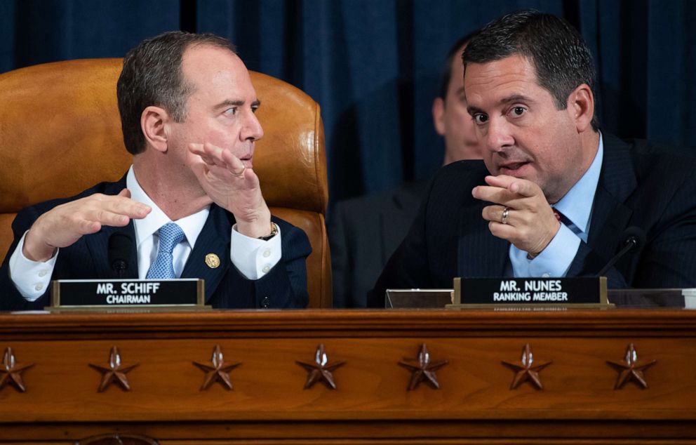 PHOTO: Rep. Adam Schiff and Rep. Devin Nunes talk during the first public hearings held by the House Permanent Select Committee on Intelligence as part of the impeachment inquiry into President Donald Trump, Nov. 13, 2019 in Washington.