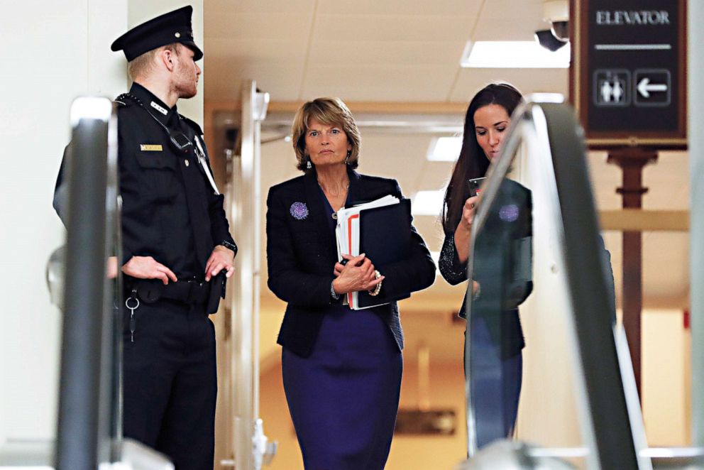 PHOTO: Sen. Lisa Murkowski walks in the basement at the U.S. Capitol on Jan. 30, 2020, while leaving at the end of a session in the impeachment trial of President Donald Trump on charges of abuse of power and obstruction of Congress, in Washington.