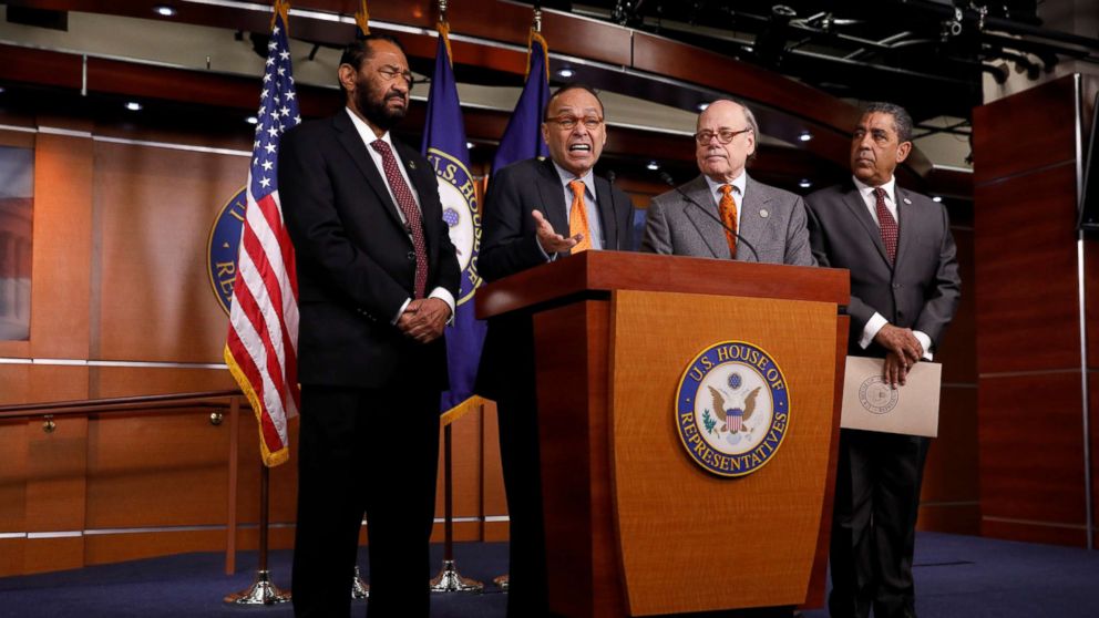 Rep. Luis Gutierrez (D-IL), accompanied by Rep. Al Green (D-TX), Rep. Steve Cohen (D-TN) and Rep. Adriano Espaillat (D-NY), speaks at a press conference announcing articles of impeachment being filed against President Donald Trump on Capitol Hill in Washington, Nov. 15, 2017. 