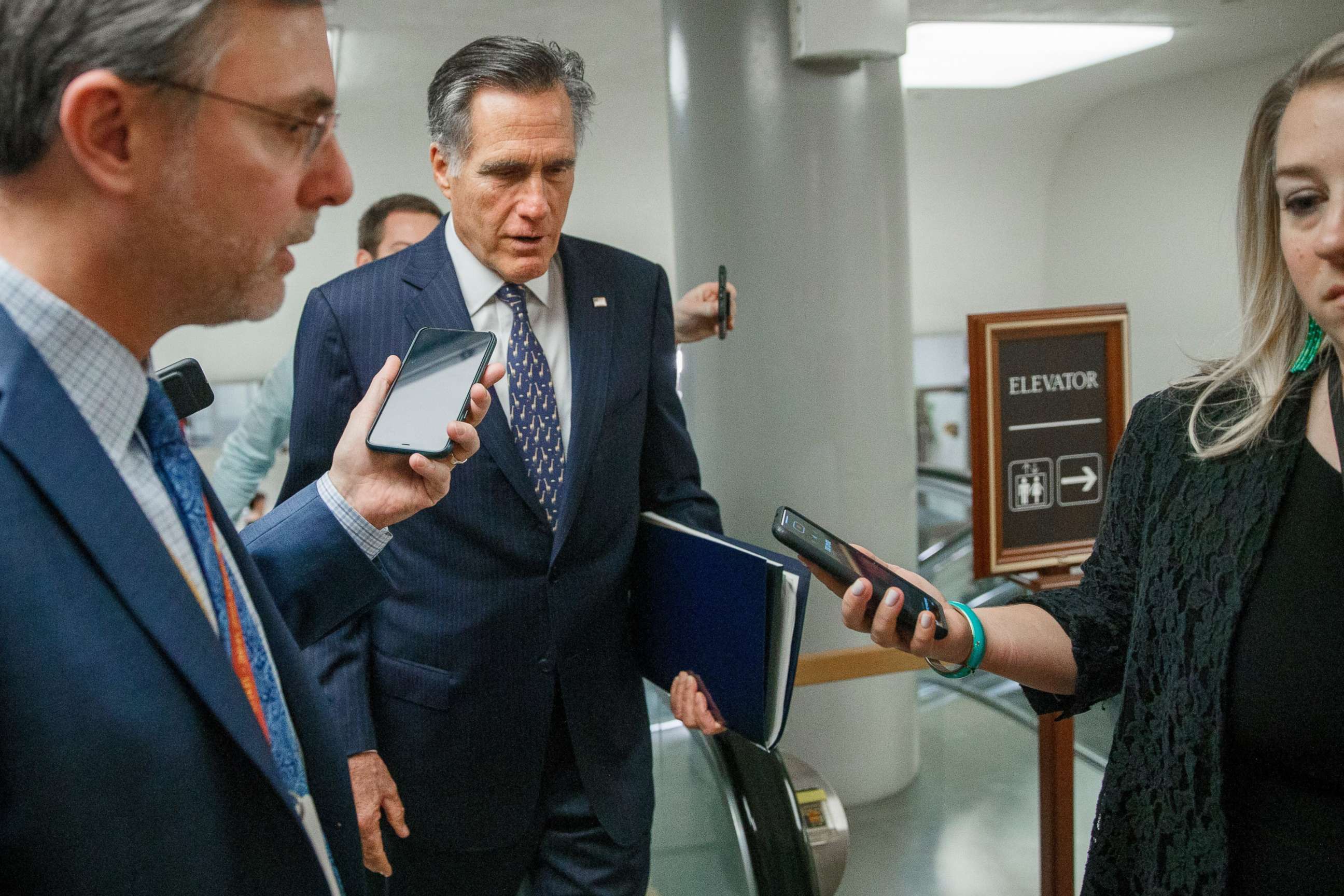 PHOTO:Republican Sen. Mitt Romney responds to a question from the news media on his way to the impeachment trial in the US Capitol in Washington, Jan. 2020.