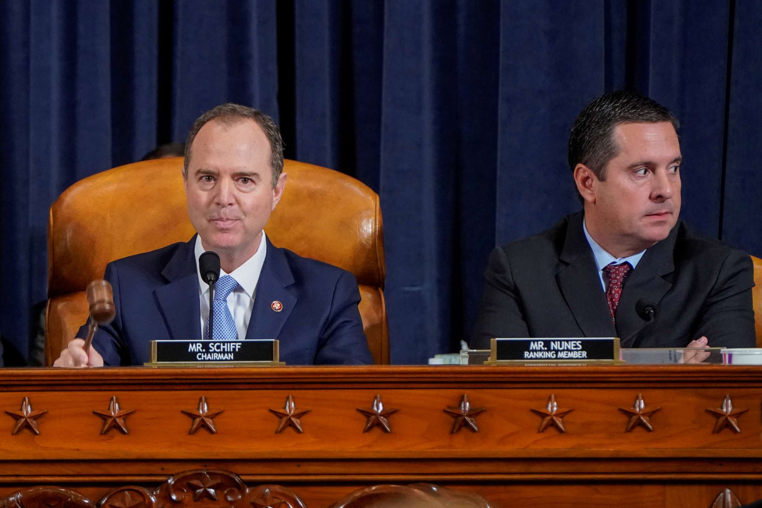 PHOTO: House Intelligence Committee Chairman Adam Schiff, left, uses his gavel next to ranking member Rep. Devin Nunez, during a hearing featuring the testimony of Marie Yovanovitch, as part of the impeachment inquiry on Capitol Hill, Nov. 15, 2019.