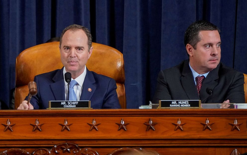 PHOTO: House Intelligence Committee Chairman Adam Schiff, left, uses his gavel next to ranking member Rep. Devin Nunez, during a hearing featuring the testimony of Marie Yovanovitch, as part of the impeachment inquiry on Capitol Hill, Nov. 15, 2019.