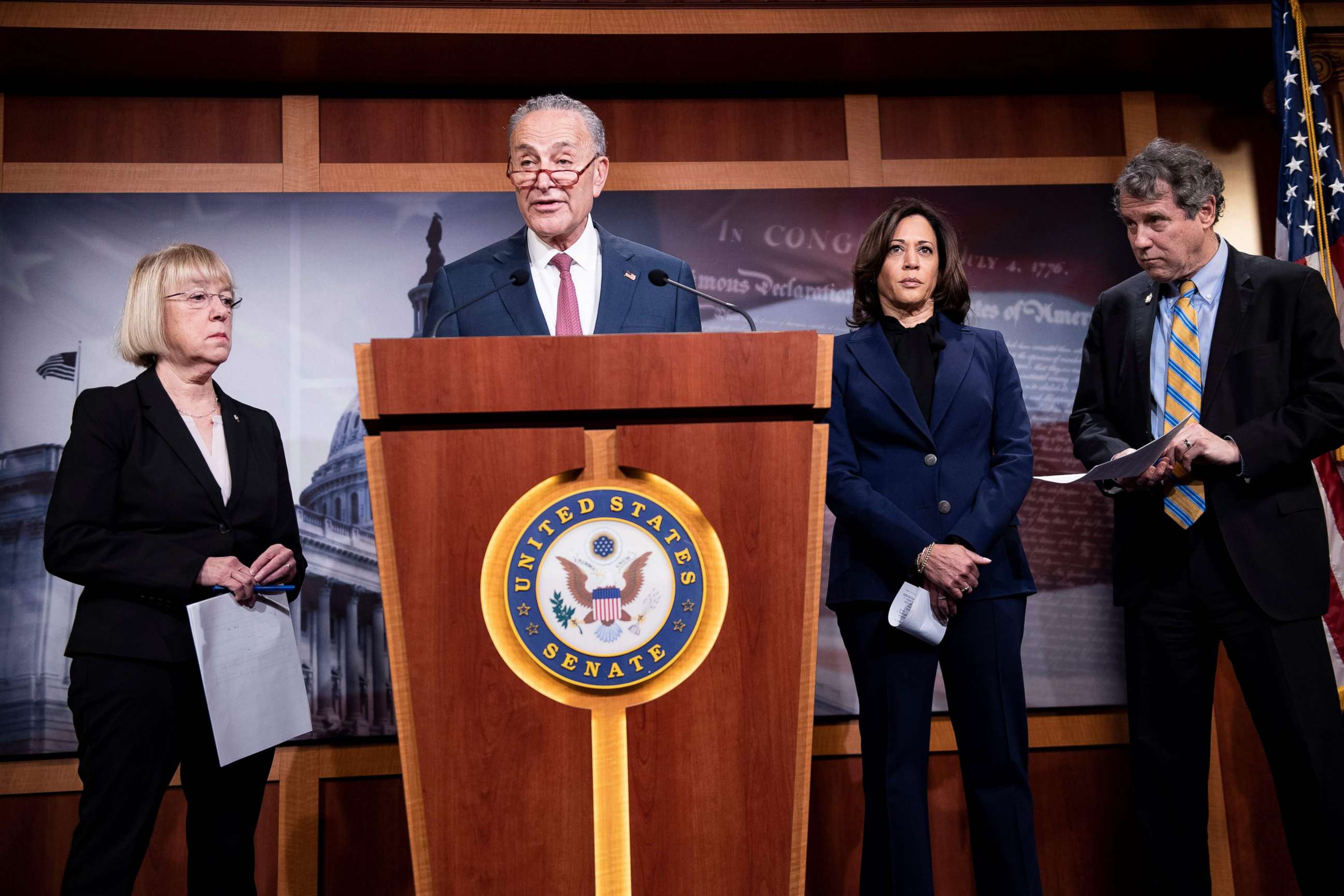 PHOTO:(L-R) Sen. Patty Murray, Sen. Kamala Harris, and Sen. Sherrod Brown listen while Sen. Charles E. Schumer holds a press conference during the impeachment trial of President Donald Trump on Capitol Hill, Jan. 31, 2020, in Washington.