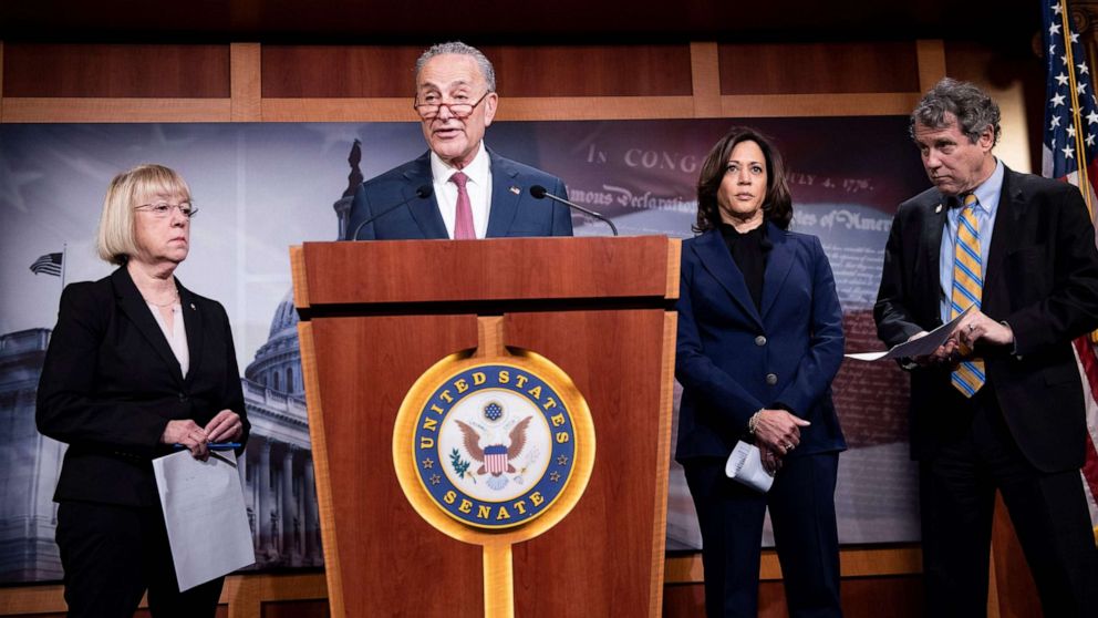 PHOTO:(L-R) Sen. Patty Murray, Sen. Kamala Harris, and Sen. Sherrod Brown listen while Sen. Charles E. Schumer holds a press conference during the impeachment trial of President Donald Trump on Capitol Hill, Jan. 31, 2020, in Washington.