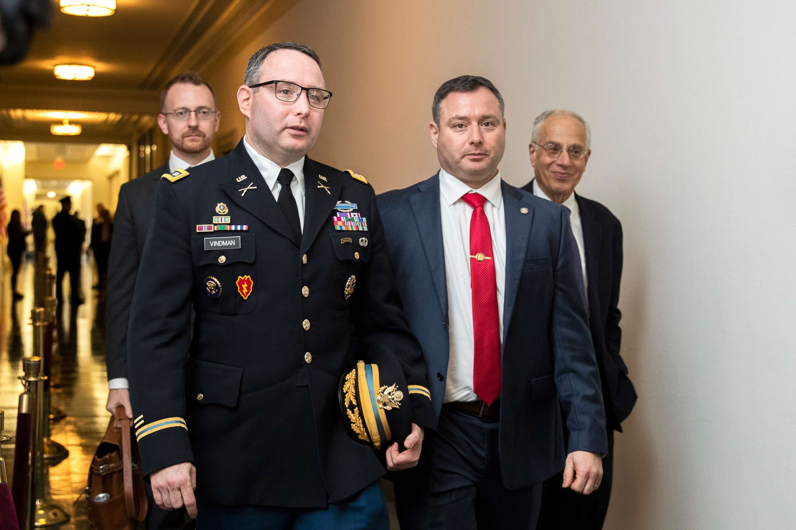 PHOTO: National Security Council aide Lt. Col. Alexander Vindman, left, and his and his identical twin brother Yevgeny, leave Capitol Hill, Nov. 19, 2019.