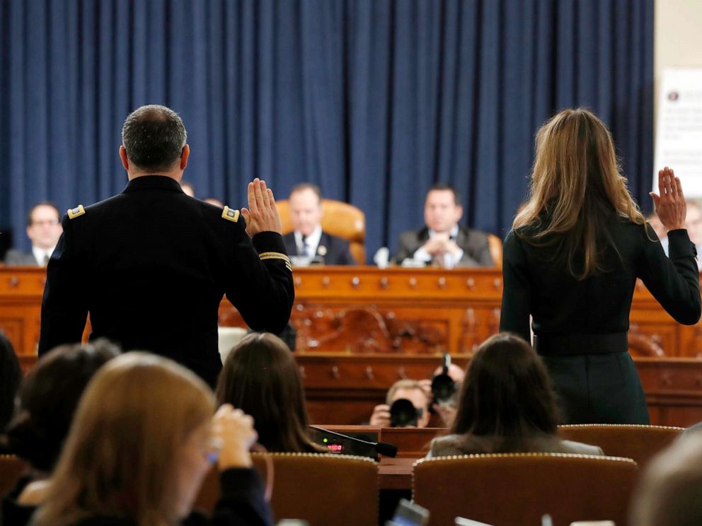 PHOTO: National Security Council aide Lt. Col. Alexander Vindman, left, and Jennifer Williams, an aide to Vice President Mike Pence are sworn in to testify before the House Intelligence Committee on Capitol Hill in Washington, Nov. 19, 2019.