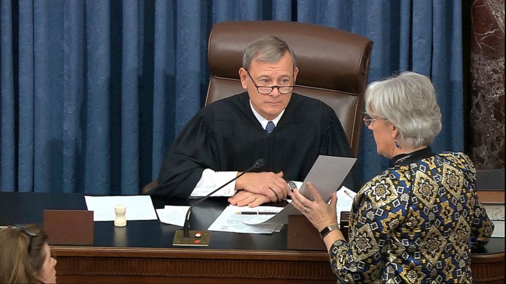 Presiding officer Chief Justice of the United States John Roberts reads the result of the vote to allow additional witnesses and evidence in the impeachment trial against President Donald Trump in the Senate at Capitol on Jan. 31, 2020, in Washington. 