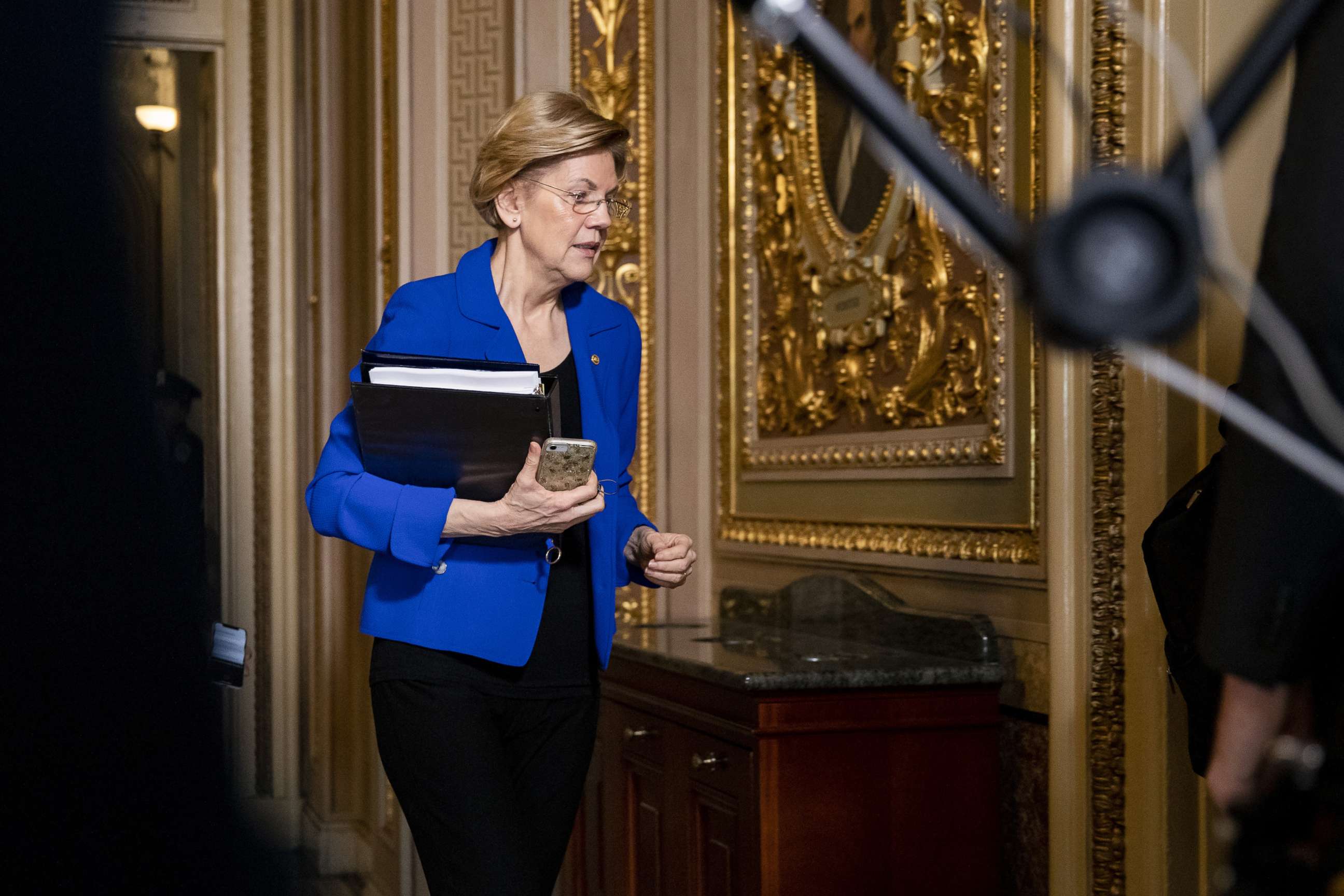 PHOTO: Democratic Presidential Candidate Sen. Elizabeth Warren heads to the Senate floor for the Senate impeachment trial of President Donald Trump on Jan. 24, 2020, in Washington.