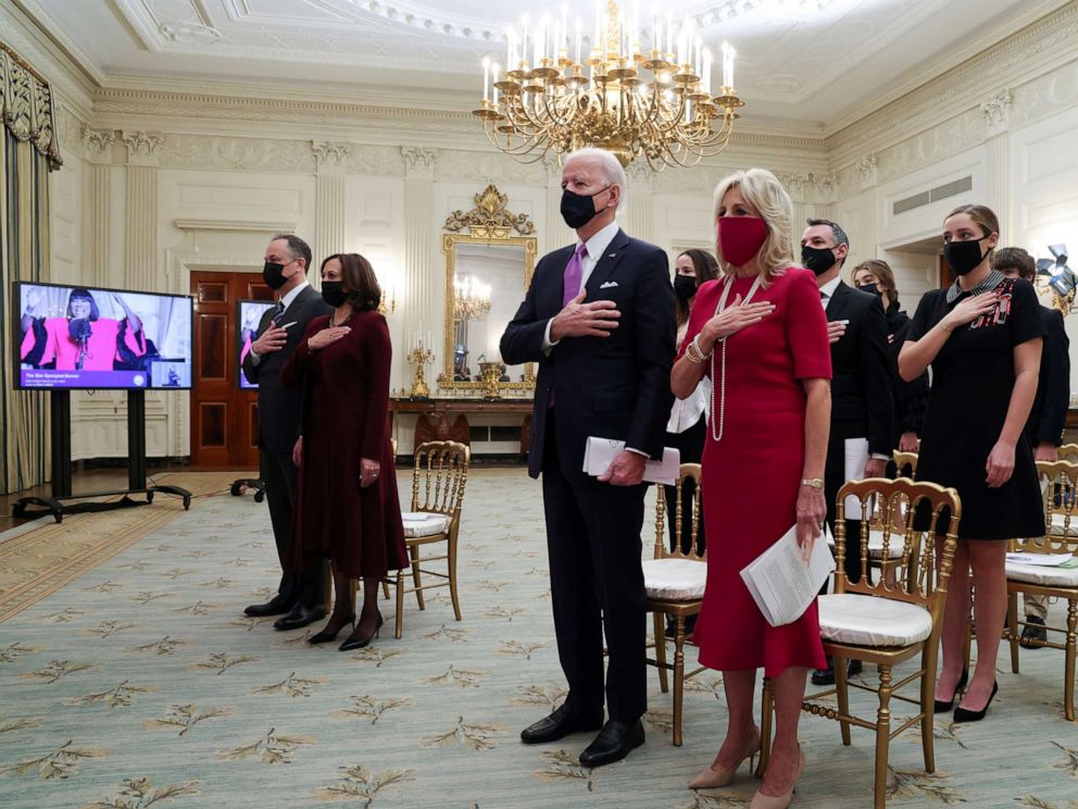 PHOTO: President Joe Biden, first lady Jill Biden, Vice President Kamala Harris and her husband Doug Emhoff participate in a virtual Presidential Inaugural Prayer Service from the State Dining Room at the White House in Washingtony, D.C., Jan. 21, 2021.