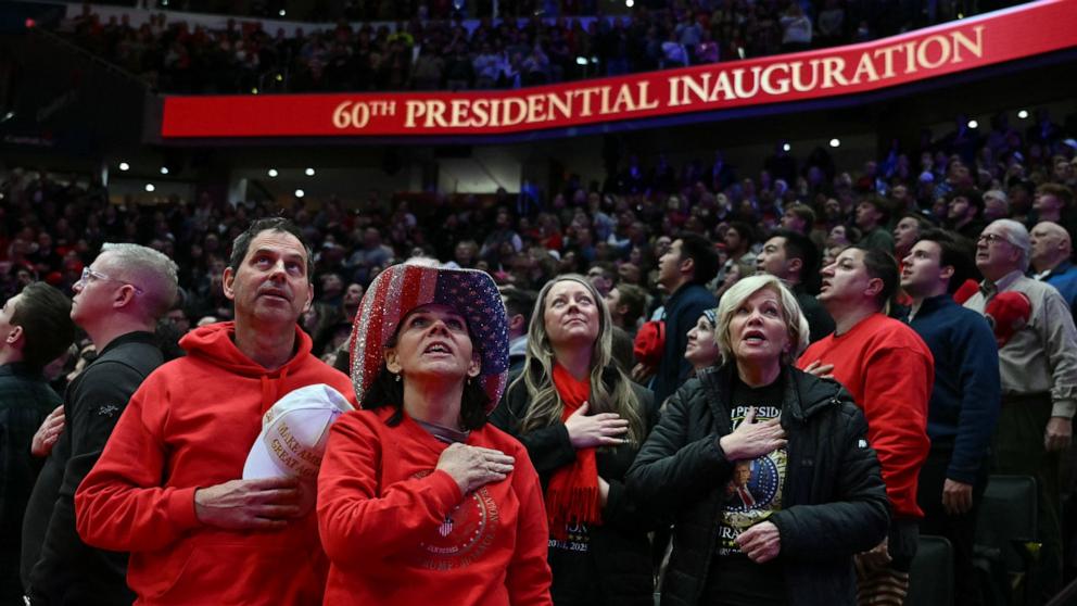 PHOTO: Supporters of President Donald Trump react as they watch a screen while Donald Trump is sworn in as the 47th president of the United States inside Capitol One Arena, in Washington, D.C., on Jan. 20, 2025. 