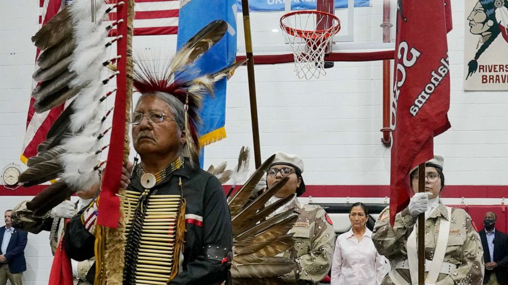 PHOTO: The Riverside Indian School color guard opens the ceremonies for a meeting where Native Americans who were sent to government-backed boarding schools will share their experiences with Interior Secretary Deb Haaland, July 9, 2022, in Anadarko, Okla.