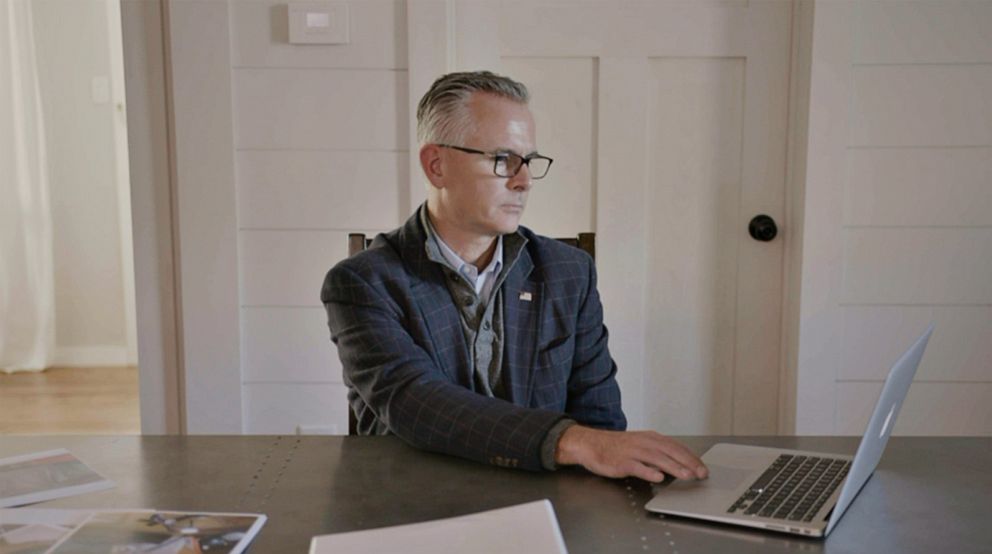 PHOTO: Tony Mattivi, the former assistant U.S. attorney in Kansas who led the "Crusaders" prosecution, reviews records from the case on a laptop. 