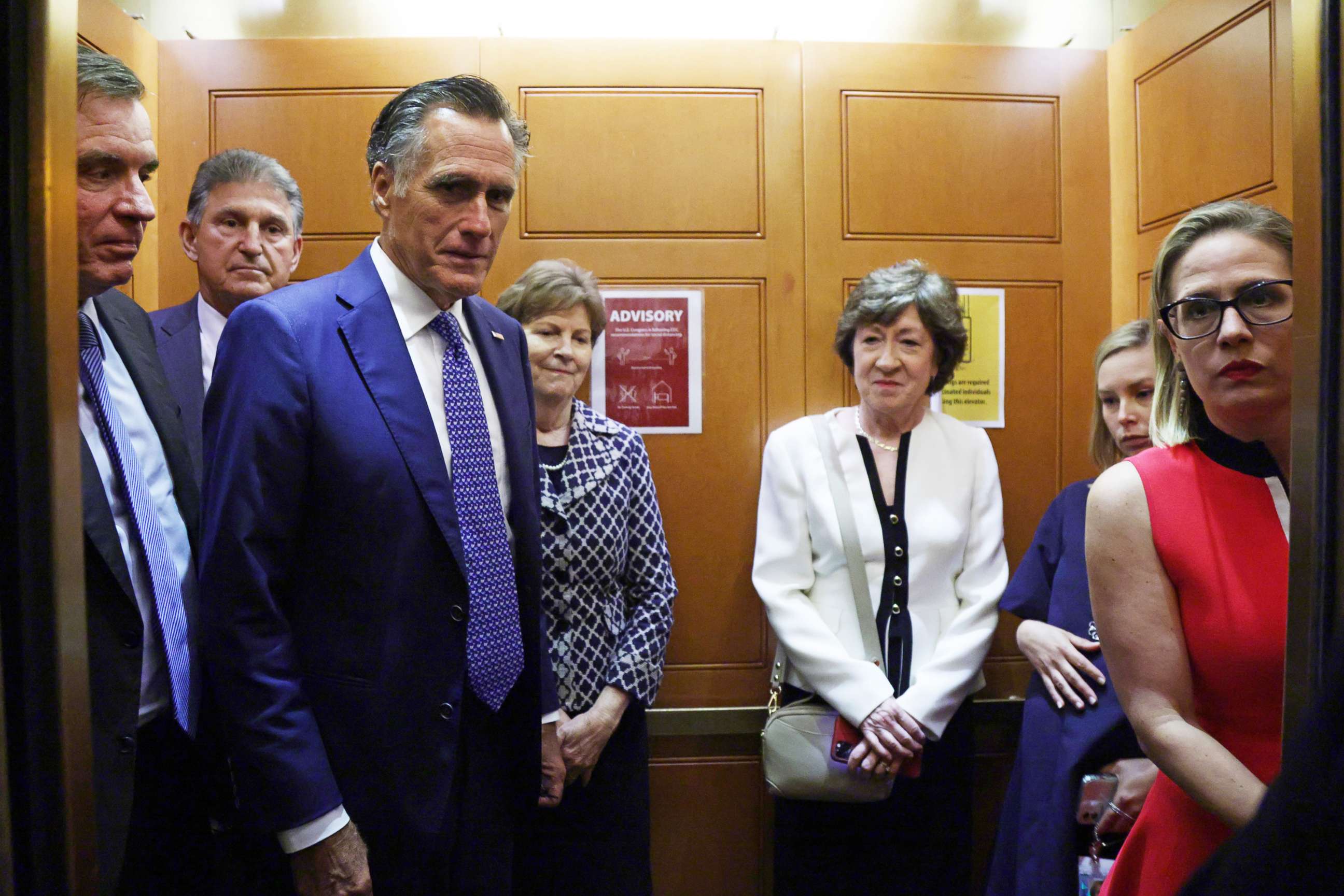 PHOTO: Sens. Mark Warner, Joe Manchin, Mitt Romney, Jeanne Shaheen, Susan Collins, and Kyrsten Sinema take a break from a meeting on infrastructure for going to a vote at the U.S. Capitol, on June 8, 2021, in Washington, D.C.