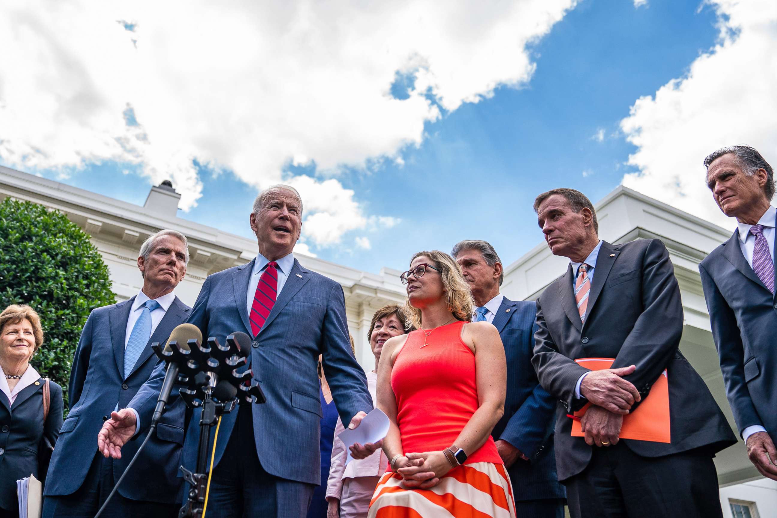 PHOTO: President Joe Biden met with Senators Bill Cassidy, Susan Collins, Joe Manchin, Lisa Murkowski, Rob Portman, Mitt Romney, Jeanne Shaheen, Kyrsten Sinema, Jon Tester and Mark Warner to discuss infrastructure plans at the White House, June 24, 2021. 