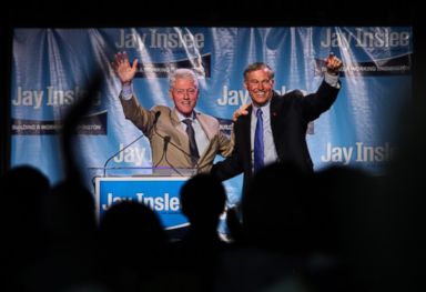 Former President Bill Clinton and gubernatorial candidate Jay Inslee speak at a fundraiser, Sept. 15, 2012, at the Washington State Convention Center in Seattle. PHOTO: