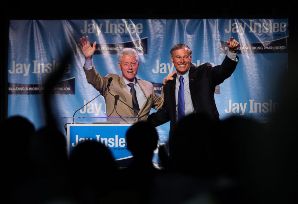 Former President Bill Clinton and gubernatorial candidate Jay Inslee speak at a fundraiser, Sept. 15, 2012, at the Washington State Convention Center in Seattle.  PHOTO: 