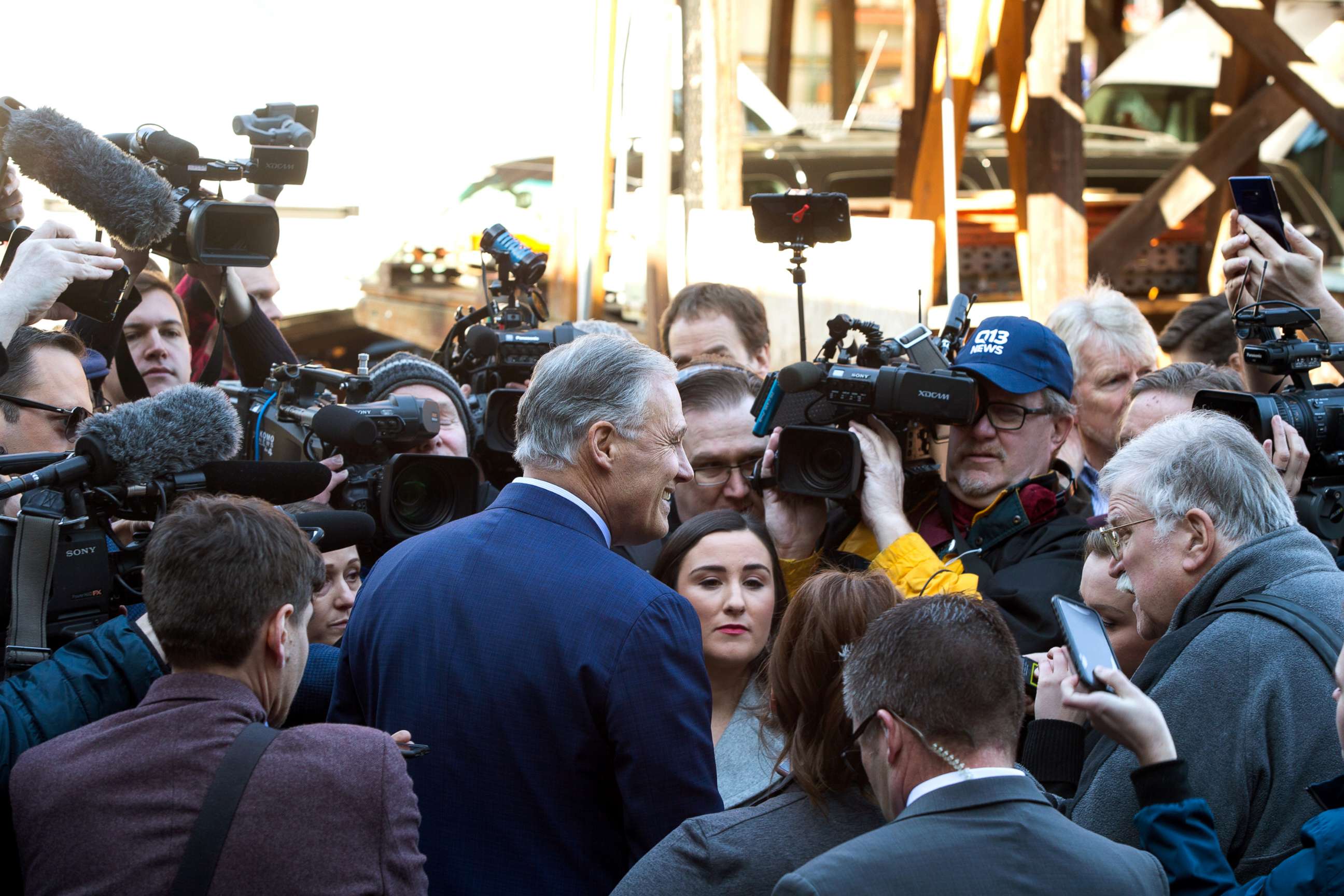 PHOTO: Washington Gov. Jay Inslee is surrounded by the press after he announces his run for the 2020 Presidency, March 1, 2019 in Seattle.