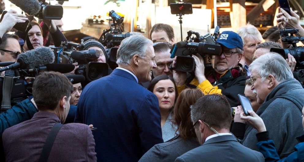 PHOTO: Washington Gov. Jay Inslee is surrounded by the press after he announces his run for the 2020 Presidency, March 1, 2019 in Seattle.